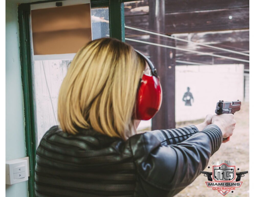 Woman wearing headphones at gun range